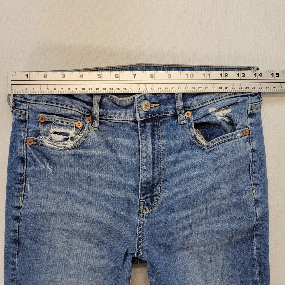 American Eagle Jeans Womens 4 Super High Rise Flare Raw Hem Stretch Ripped Denim - Picture 9 of 11